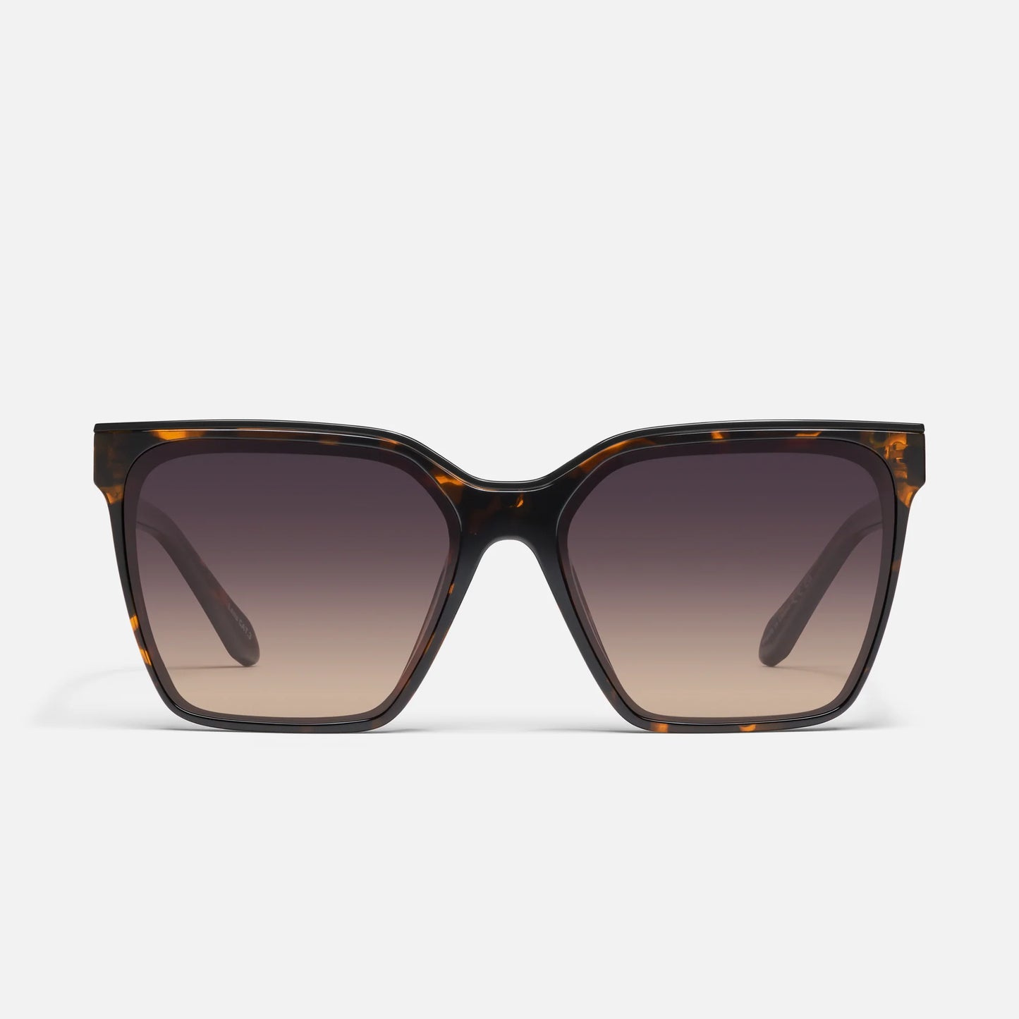 Sunglasses with tortoiseshell frame and gradient lenses on a white background