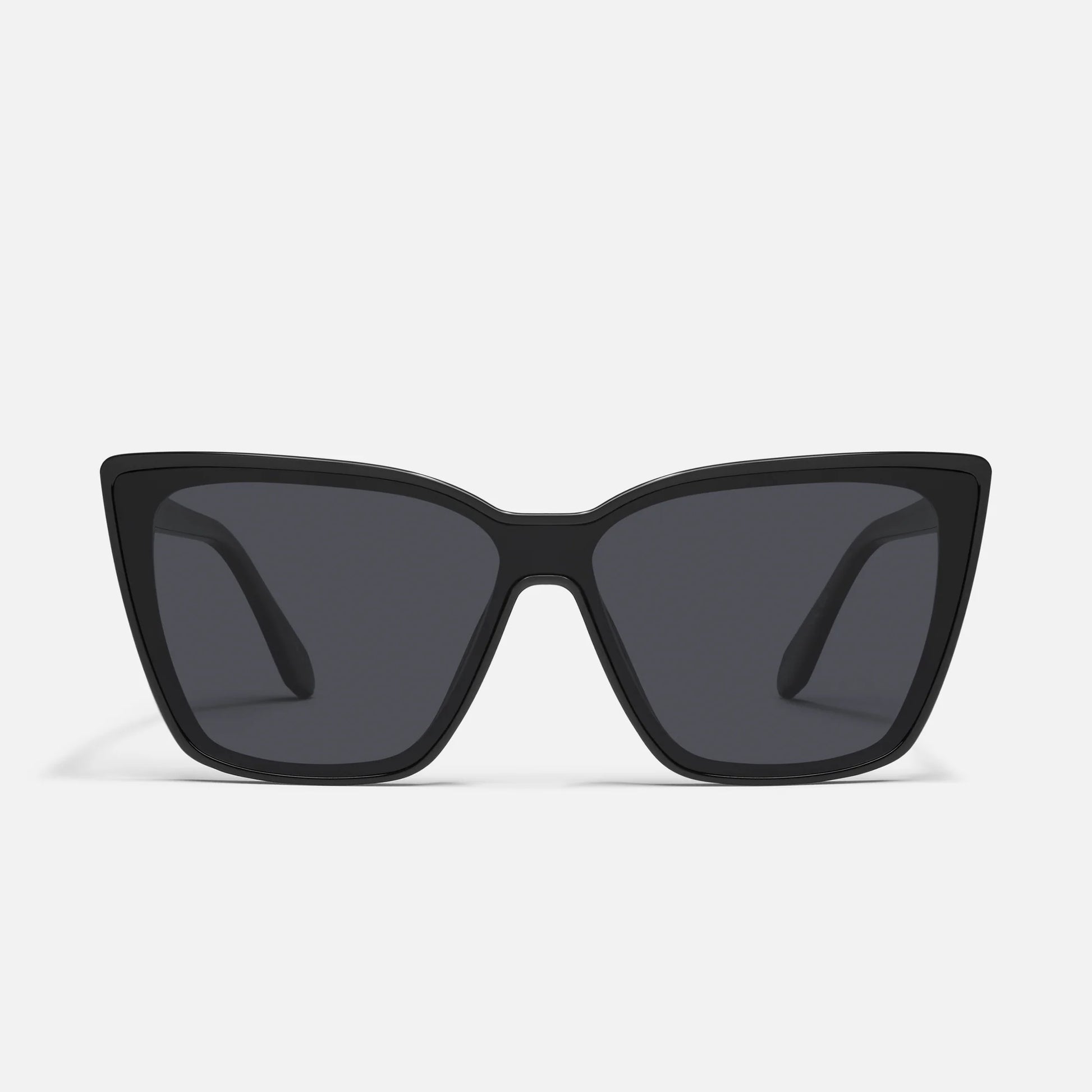 Black cat-eye sunglasses on a light gray background