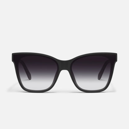Black sunglasses with gradient lenses on a white background