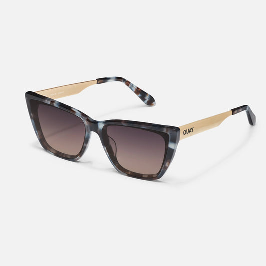 Sunglasses with tortoiseshell and beige frame on a white background
