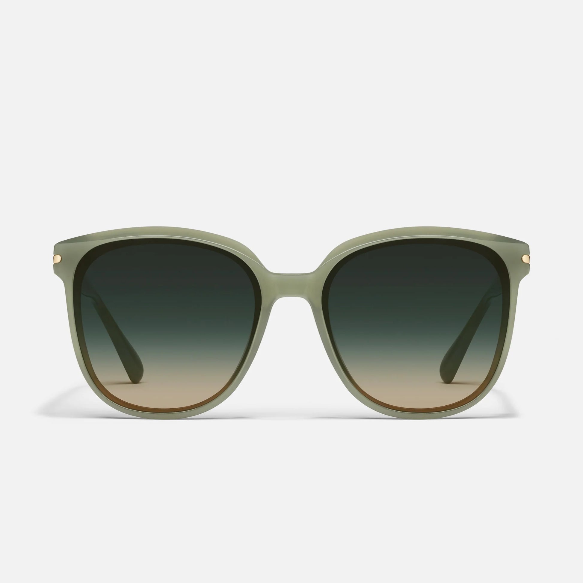 Sunglasses with green gradient lenses on a white background