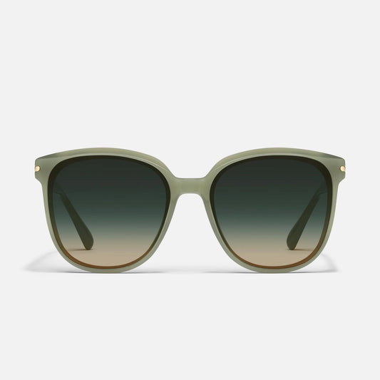 Sunglasses with green gradient lenses on a white background