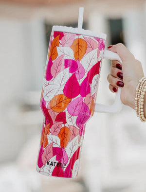 fall leaves tumbler being held up