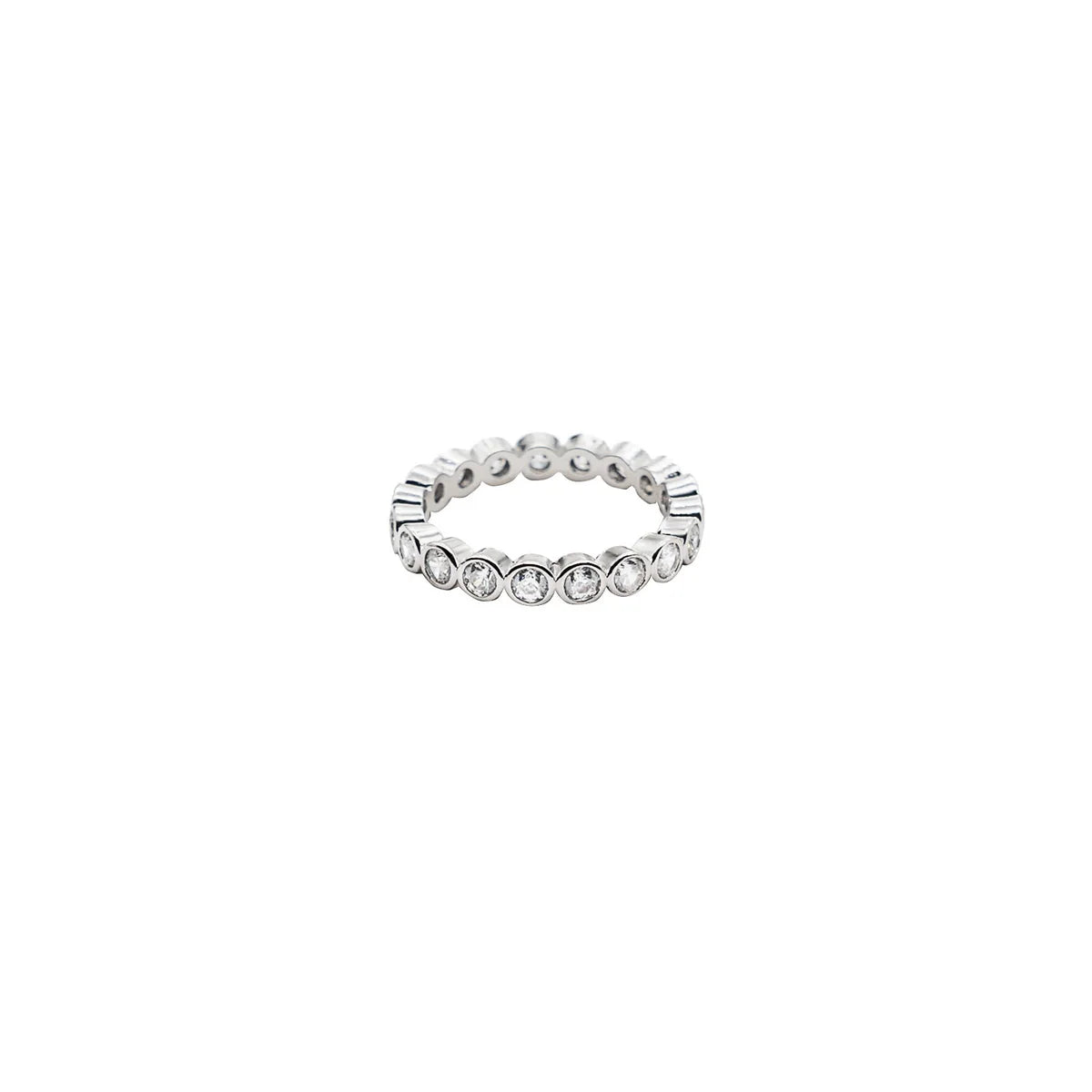 Silver ring with clear stones on a white background