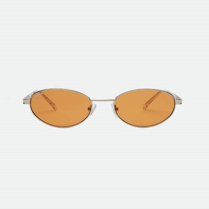 Sunglasses with orange lenses and silver frames on a white background