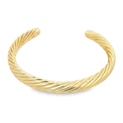 Gold bracelet on a white background