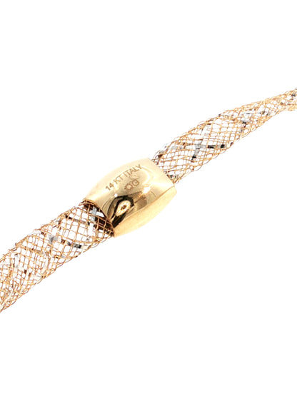 A close-up of a gold mesh bracelet with a polished gold clasp engraved with '14K Italy QG', set against a plain white background.