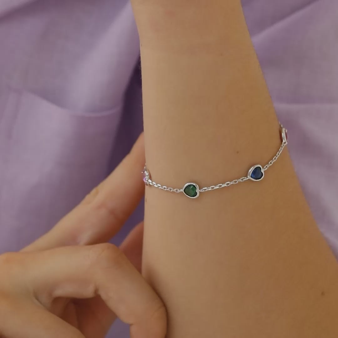 Age Group: Cute for Little Girls and Preteens; Safe for Sensitive Skin
Material: 925 Sterling Silver
Bracelet Length: 6 inches, 1 inch extension
Main Stone: Multi-Colored Cubic Zirconia
Metal Stamp: 925
Video showing the bracelet being worn on a little girl 