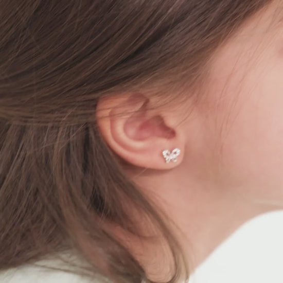 Age Group: Ideal for Infants, Toddlers and Girls; Safe for Sensitive Ears
925 Sterling Silver
Earrings Size: 9mm W x 6mm H Bow; 8mm post
Main Stone: Pink and Clear Cubic Zirconia
Metal Stamp: 925
Window Box Included
Video of a young girl wearing the butterfly earrings