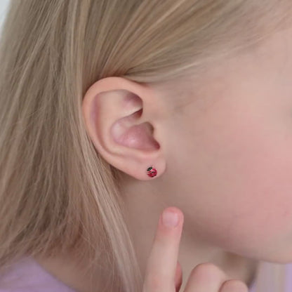 Age Group: Cute for Infants, Toddlers and Little Girls; Safe for Sensitive Ears
Material: 14k Yellow Gold
Earring Size: 5mm ladybug, enamel; 7mm threaded earring post
Color: Enamel
Metal Stamp: 14k
video Ladybud earrings on a young girl
