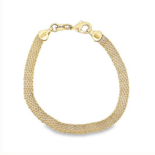 Gold bracelet on a white background