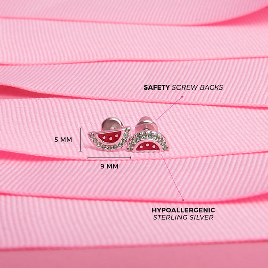 Age Group: Ideal for Toddlers and Little Girls
Size: 9mm W x 5mm H (green) watermelon; 7mm threaded earring post
Material: 925 Sterling Silver
Stone: Cubic Zirconia
Metal Stamp: 925
Window Box Included
Picture of the watermelon earrings with measurements and details on materials with pick background