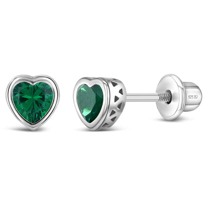 Heart-shaped green gemstone earrings with silver setting on a white background