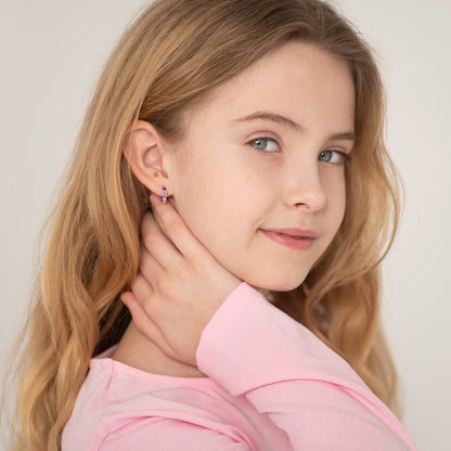 Age Group: Cute for Girls or Teens; Safe for Sensitive Ears
925 Sterling Silver
Earring Size: Outer: 0.47 in. (12mm); Inner: 0.35 in. (9mm)
Metal Stamp: 925
Cascading heart design with purple and pink earrings on sterling silver. Young girl wearing the earrings.